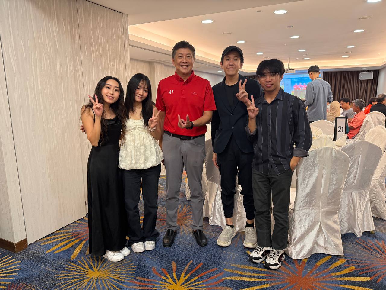 J.P.A.G Band with guests at an event